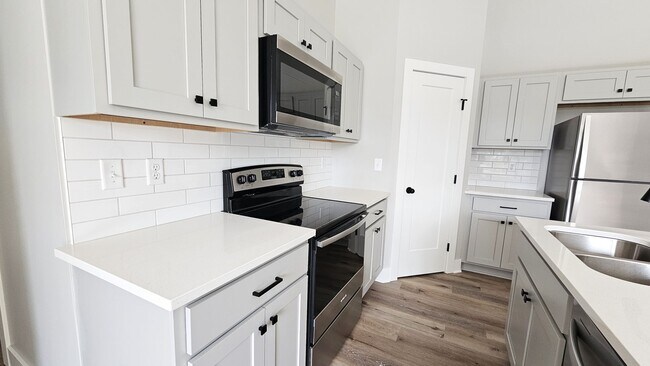 Photo - New 3 bedroom/2 bath townhome with double ...