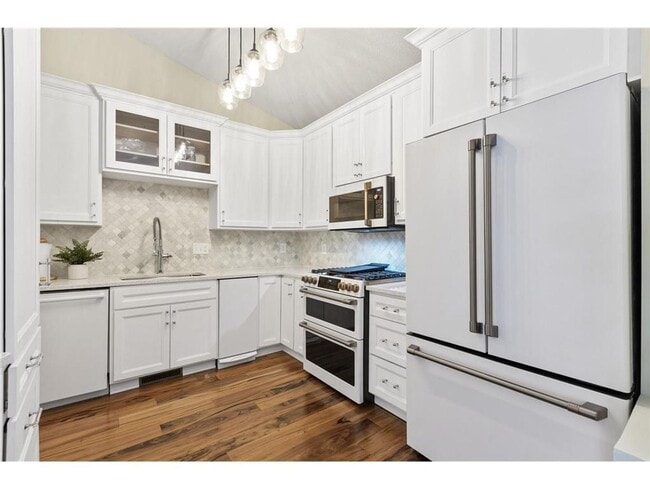 Photo - Updated 3BR Townhome in Rogers | Garage + Pool Access