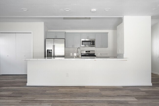 Photo - Oversized kitchen and living area!