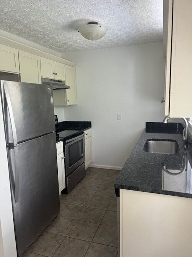 Photo - Spacious 2-Bedroom Townhouse with Garage