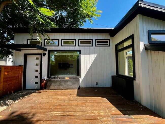 Building Photo - Modern Private Studio with Loft, Patio & Off-Street Parking