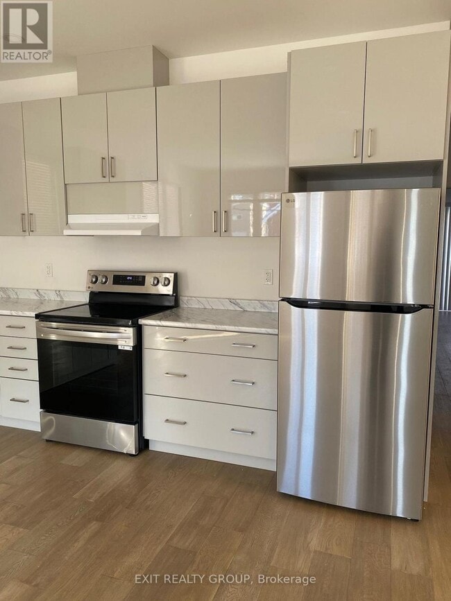 Photo - 211 Dundas St W Unité 1