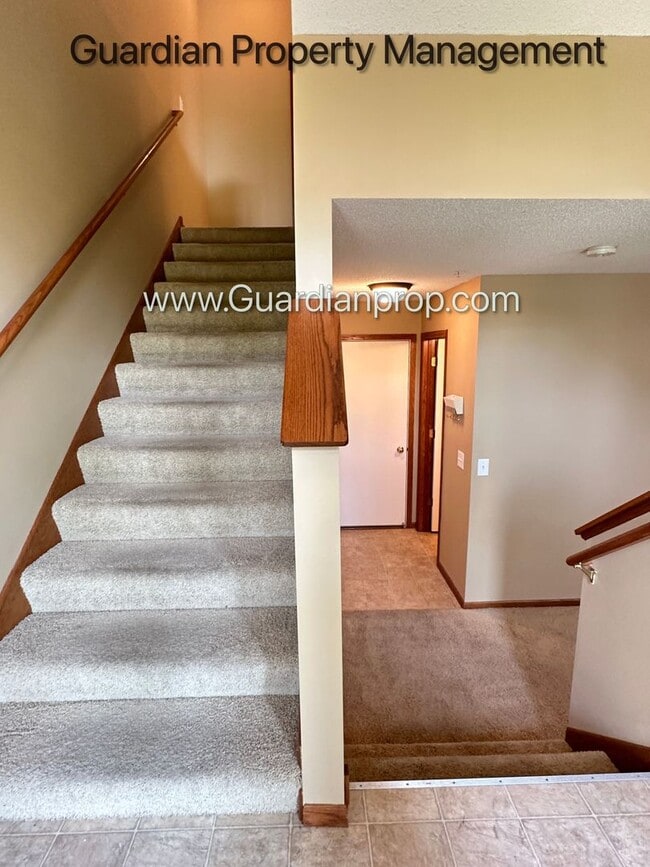 Photo - Pet Free Champlin Town Home, 3.5 Baths, 2 Car Garage, Dishwasher, Balcony, Available end of April