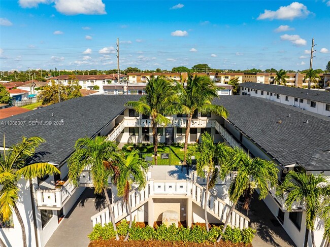 Building Photo - 1345 W 28th St Unit 6