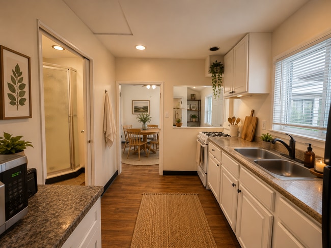 Photo - READY TO MOVE IN- MUST SEE - TWO CAR OFF STREET PARKING SPOTS AND UTILITIES PAID