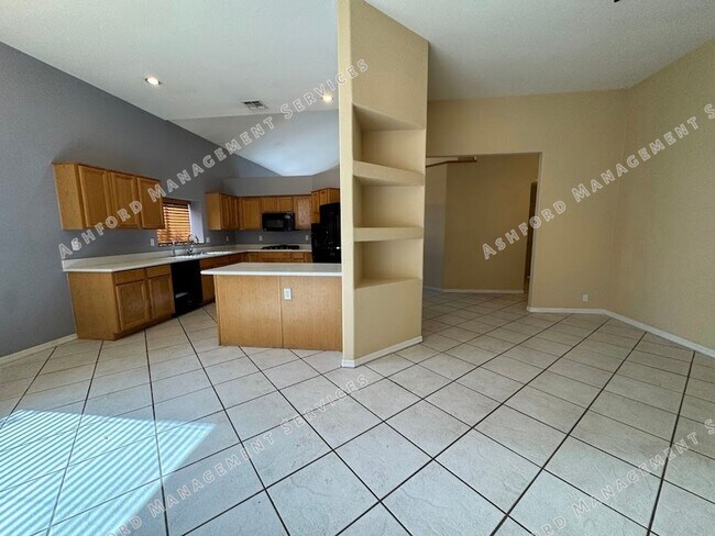 Photo - Spacious 4-Bedroom Home with Main-Level Primary Suite & 3-Car Garage