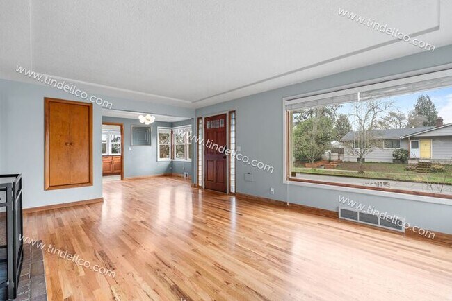 Photo - Charming 4-Bedroom Home in St. Johns with Finished Basement & Spacious Living Areas