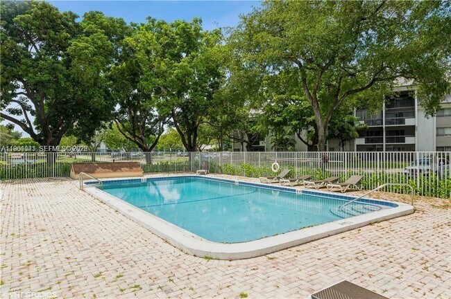 Photo - 731 N Pine Island Rd Unit 202