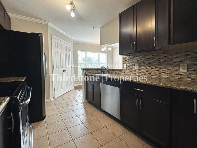 Building Photo - 7800 Point Meadows Dr Unit 631