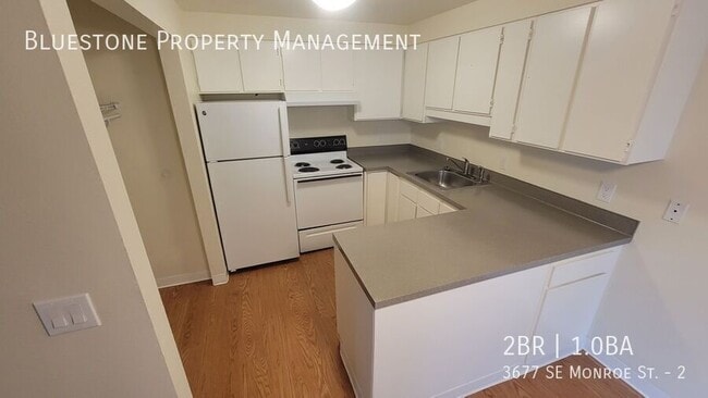 Building Photo - 3677 SE Monroe St Unit 2