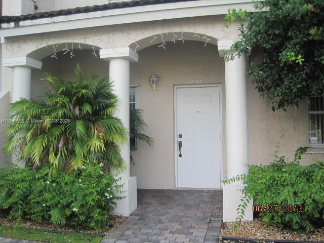 Building Photo - 5630 NW 114th Path Unit 106