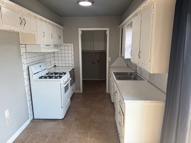 Photo - 2 bed , 1 and a 1/2 bath, garage conversion with two living rooms and a storage space! Moore scho...