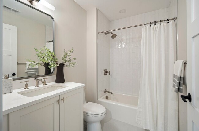 Photo - 1 Bed • 1.5 Bath • Garage Parking • New Luxury Building – Available Now, December, or January