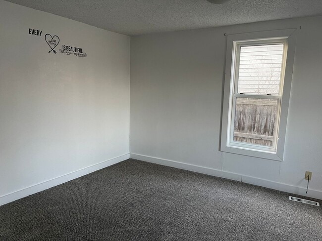 Photo - 4 bedroom, 1 bath. Dogs Ok, Remodeled in 2020, Laundry Hookups and Fenced Yard