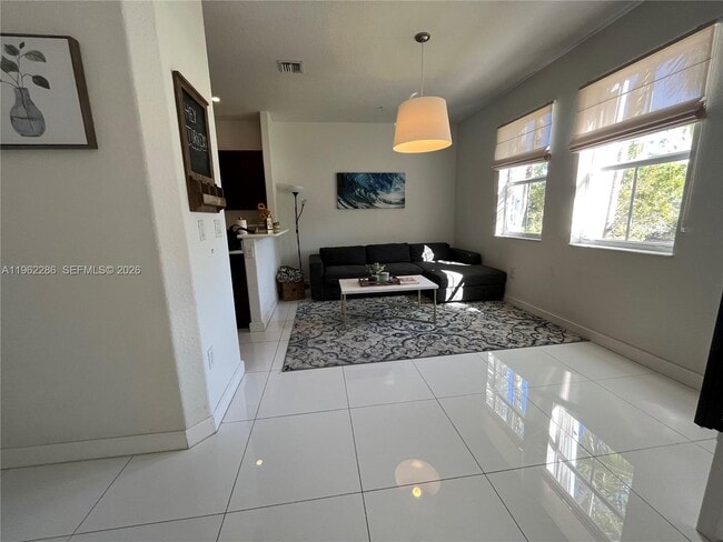 Building Photo - 10012 NW 7th St Unit 203