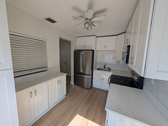 Photo - Charming Remodeled 3BD/1BA + Bonus Room | Fenced Yard | Pet Friendly