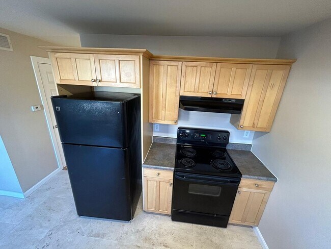 Photo - 2 Bedroom 1.5 Bath Townhome. Gated Community. Upgraded & 2 Parking Spaces