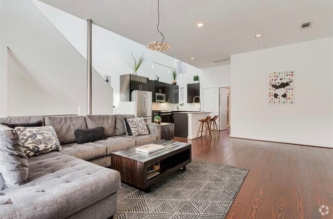Building Photo - Modern Loft w/ Rooftop Deck & Downtown Vie...