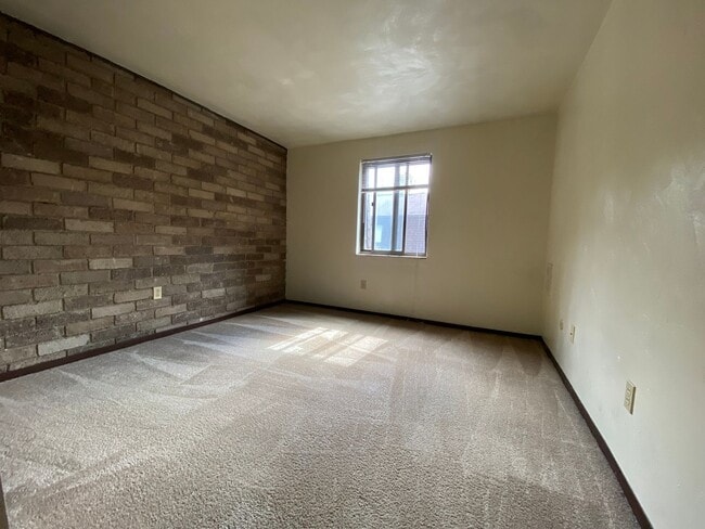 Photo - Amazing 1 Bedroom with Beautiful Exposed Brick! Off-Street Parking & Laundry Included! Unit 312