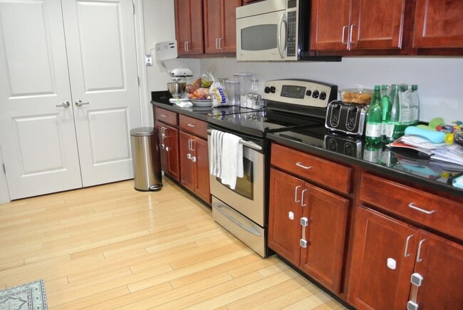 Photo - GREAT 2Br/2Bth in modern building. Central Air. Laundry in unit!