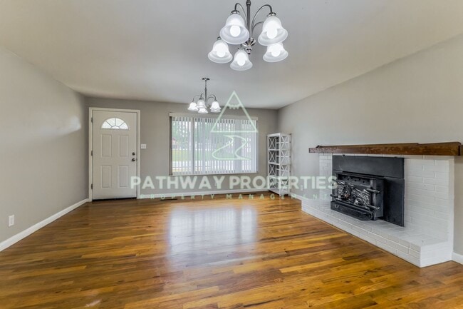 Photo - Charming 3-Bed, 1.5-Bath Brick Home with Spacious Living & Outdoor Retreat in Clearfield, UT!