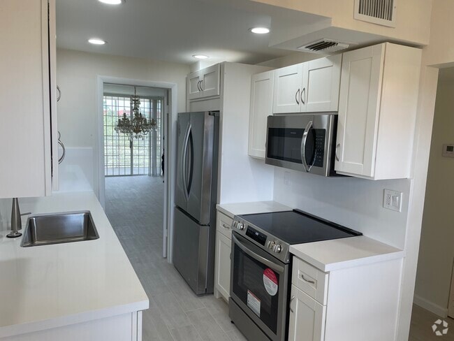 Building Photo - 3099 NW 48th Ave Unit 455 Rental