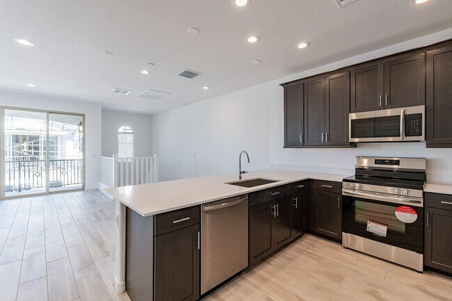 Photo - 2024 Luxury Townhome | 2-Car Garage, Quartz Kitchen & Resort Pool