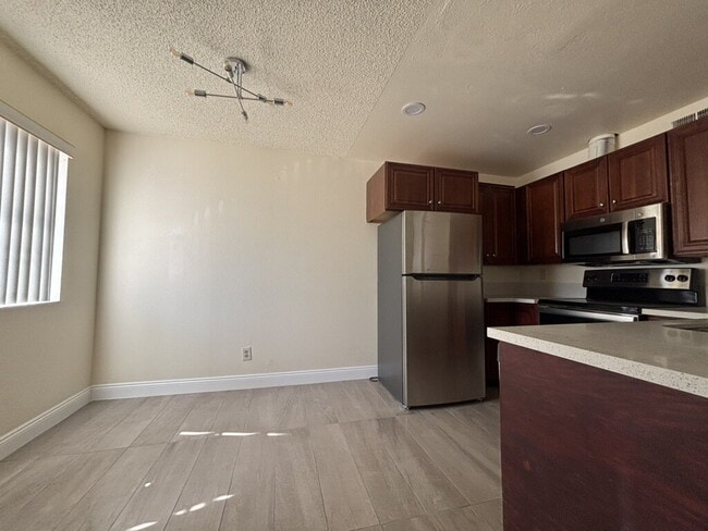 Photo - Downstairs 2BR/1BA—recently updated with n... Unit B