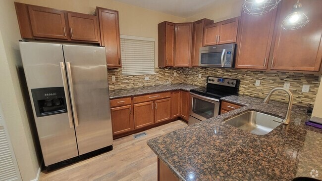 Building Photo - Check out this beautiful multi level 2 bed... Rental
