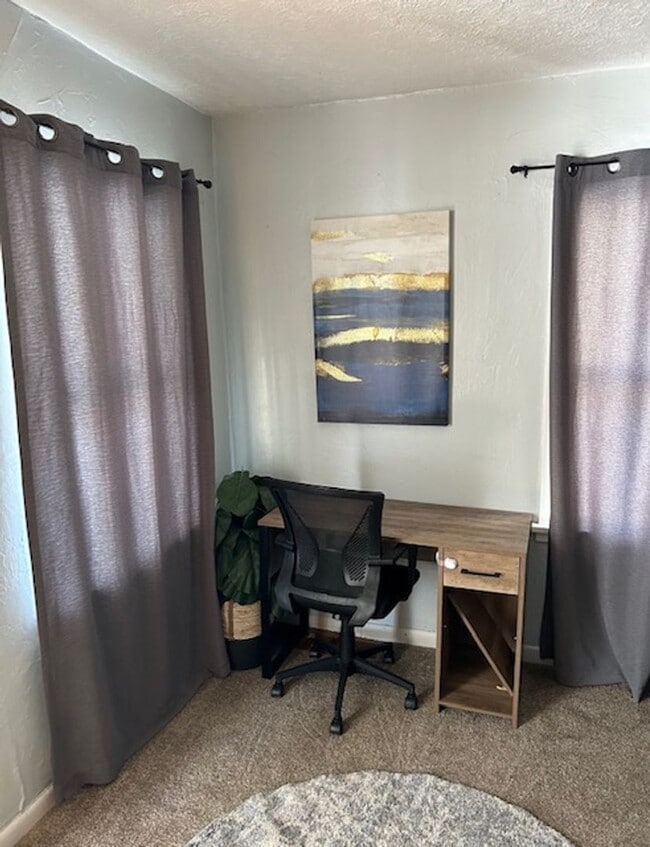Photo - Charming 2 Bed, 1 Bath Home with Fenced Yard & Garage – Prime Location!