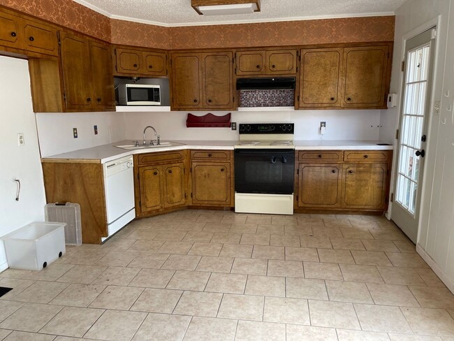 Photo - Introducing a 2-bedroom, 1.5-bathroom condo that offers the perfect blend of comfort and convenie...