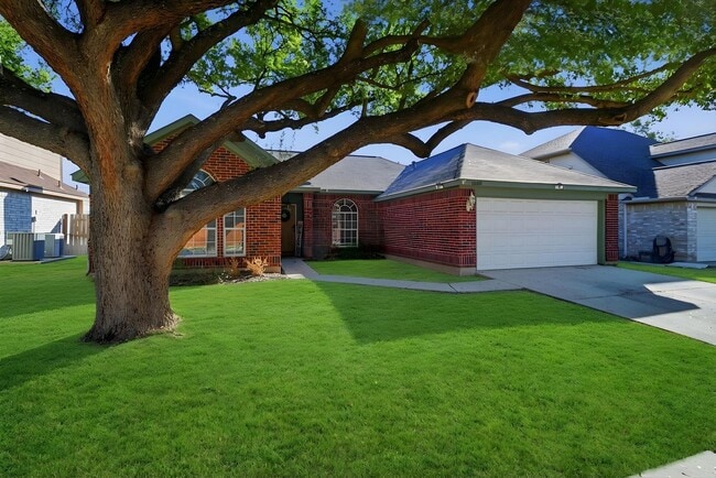 Building Photo - Vaulted Ceilings, Stone Fireplace & Updated Baths!