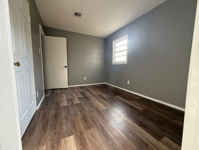 Building Photo - For Rent — Spacious & Affordable 4 Bedroom Home!