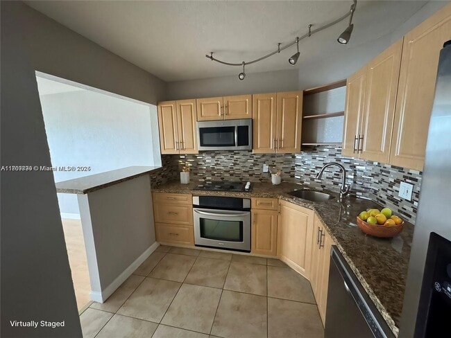 Photo - 3301 Spanish Moss Terrace Unidad 604 Rental