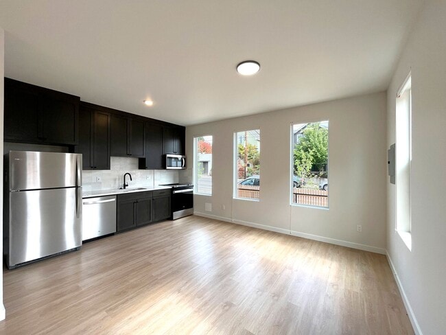 Photo - Stunning Modern Townhome-Style Unit with Washer/Dryer Included, A/C!