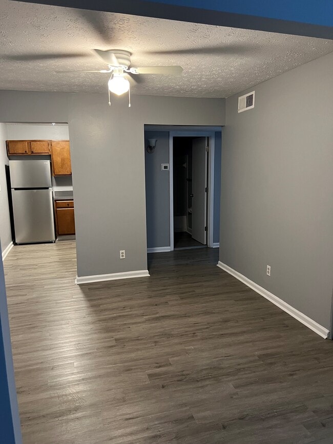 Living Room/Dining Room - Woodgate Apartments