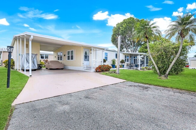 Building Photo - Furnished 2BR/2BA Home in Jamaica Bay Vill...