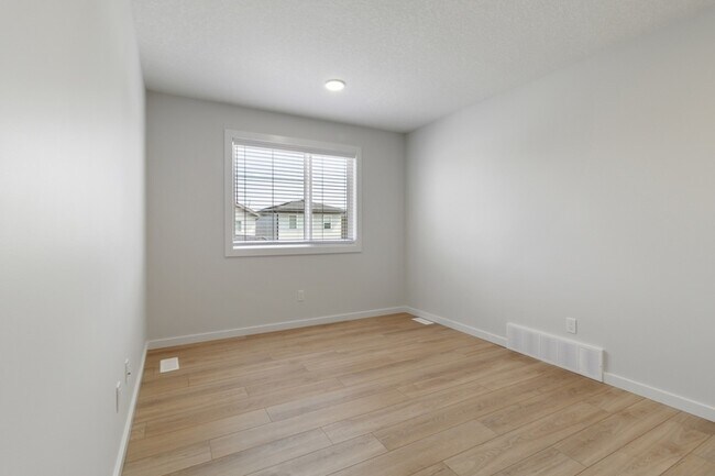Photo - 20744-20724 24 Ave NW