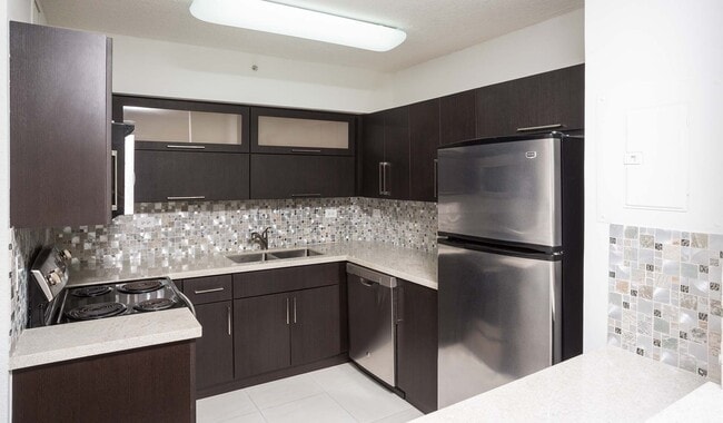 Kitchen features stainless steel appliances