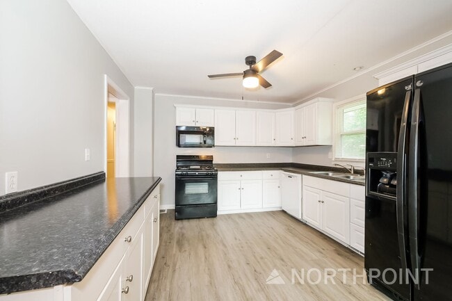Photo - 3 BR/2.5BA | Newly Renovated Single Family Home | Large Deck | Fenced backyard!