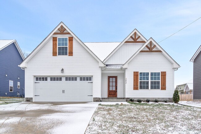 Building Photo - Pet Friendly Three Bedroom with Bonus!