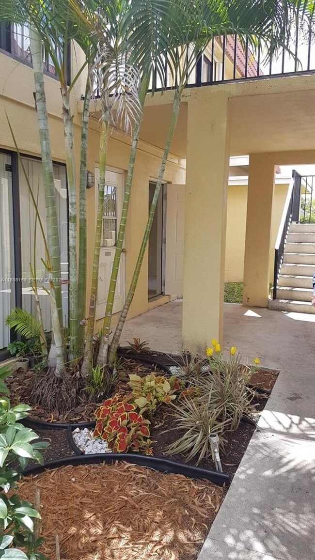 Building Photo - 11386 Royal Palm Blvd Unit 11386