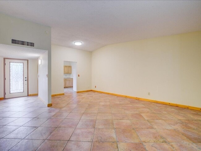 Photo - Charming 4-Bedroom Home with Spacious Living & Private Backyard!