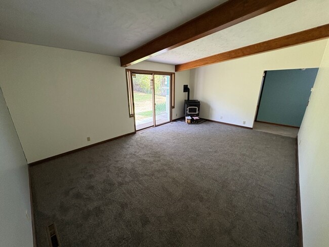 Photo - Spacious Home with Attached Garage & Fenced Backyard