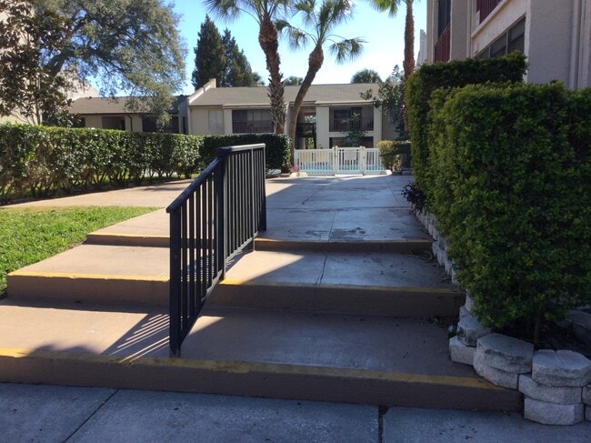 Walking toward pool - 8610 Huron Ct Unit 61