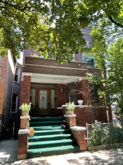 Building Photo - 3159 S Lowe Ave Unit 1F