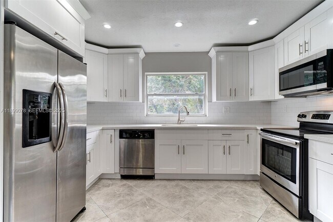 Building Photo - 10131 NW 35th St Unit 15