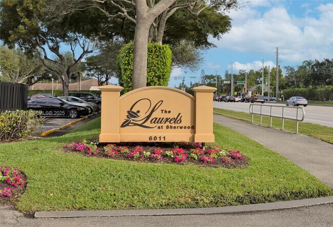 Building Photo - 6051 10th Ave N Unit 233