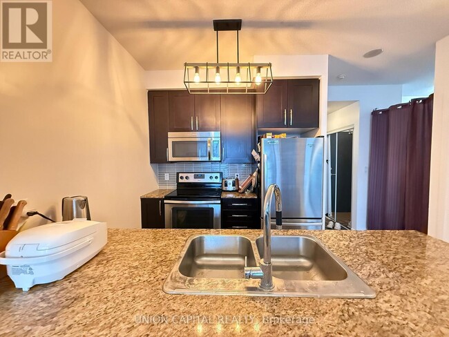 Photo - 4070 Confederation Pkwy Unit 2608