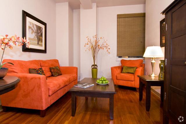 Sala de estar - Gravier Place Apartments